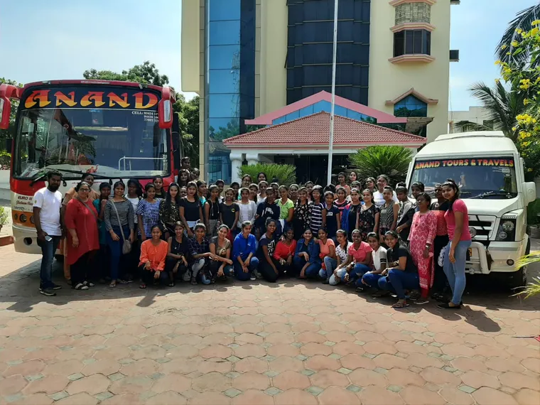 A school group ready to board a tourist coach arranged by Marvel Adventures